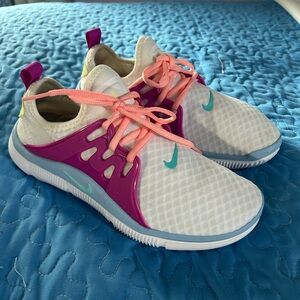 Nike Women's Athletic Shoes - White, Pink, and Teal Accents
